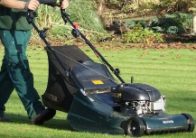man mowing
